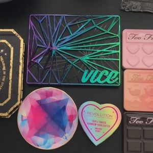 Prestige eyeshadow palettes and highlighter